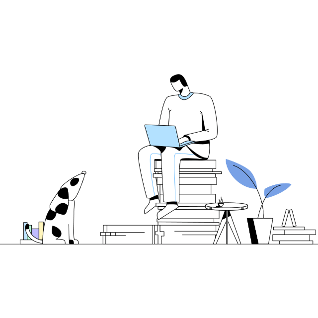 A man typing and his dog
